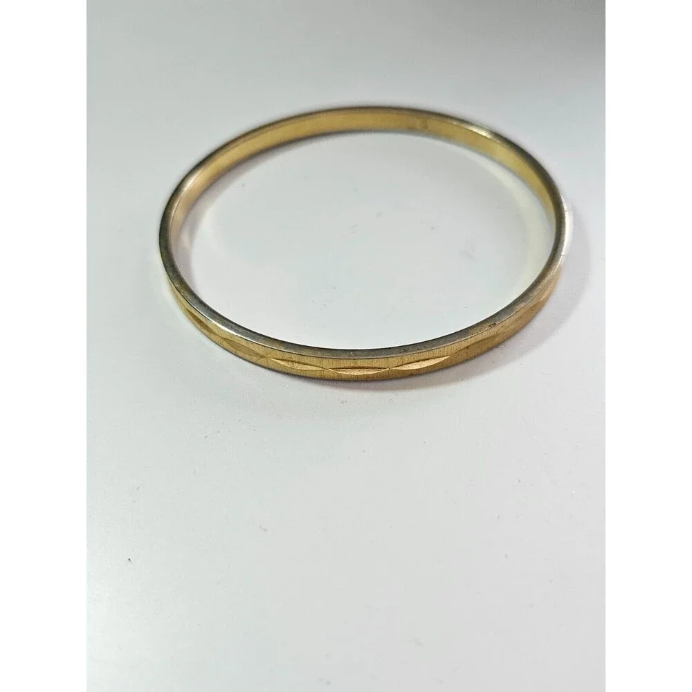 Monet gold tone diamond cut bangle bracelet 7.75